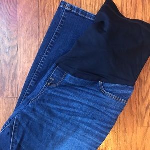 Three pairs of skinny maternity jeans.